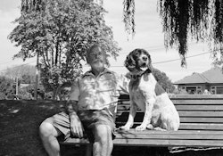 If we are lucky, very lucky, we get the chance to share our lives with someone that helps us grow into what we can be. I was really lucky. I met and fell in love with my wife, Salah. Together we raised our family and from her I learnt many things. Things I could never have learnt from anyone else. I learnt about the blending of cultures. I learnt about respect, about compatibility, about time, and how quickly it can go. I learnt about honesty and I came to understand stickability, determination and resilience, the sort of things we might all need to get through these earthquakes. After our home was trashed in the September quake Salah discovered a lump in her breast and was diagnosed with cancer. She had an operation but between the February and June quakes it returned. It had become very aggressive and the prognosis was not great at all. Then June came and our home was smashed once more. Of course we tried to value the important things like the garden and the river view but can you imagine life with cancer and having to tolerate the piles of shingle and shit up to here. No power. No sewer. Trying to cover the cracks in the wall of our lounge with tapa cloth to make the place more pleasant for her. It was just the pits. Salah died in November and for me… for me the earthquakes had just become a horrible background to my wife’s death. The December quake, what was that? Just a blip to me. Today I’m looking out through my front window, over a deck that looks onto the river and I can see the top of a City Council park bench that was left dumped on the side of the road. A bench that my son and I took and concreted into the riverbank and on it we put a plaque in memory of Salah. I am looking out there now and I can see the road cones and the flowers that I’ve put there because today is the 22nd of February, one year on from that devastating quake. Outside other people have been doing the same, walking round the river putting flowers on cones and I’m looking out at that and thinking, yeah, this place is special. Okay, I know the house will go but hopefully the river view will stay and if it can stay as a park, a place we can all share, then this area would be a good legacy to have for a beautiful wife and mother, a woman who did so much in her life for so many. To me, this view, this lovely river, would mean that Salah wouldn’t be forgotten. It’s a thought that gives me… it gives me a little peace. To have had this place has just been magnificent, to have shared it with my wife and family is beyond special. Earlier on, after the first couple of quakes, I thought our life would never be the same with our home being smashed and that’s true, but in the end you realise houses and land are not the most important thing. If people can be alive and endure and move on, that is what counts. As hard as it is at the time we’ve all got to do it, try and move on a little bit. And now I am told there is a plan–a park–that will make this place available to all. That is what I hope will happen, because if the Council or the Government were to turn it into something else, into money, if they conspired to resurrect the land and sell off sections to the highest bidder, I would be absolutely gutted. That would be like soiling all our memories, wouldn’t it. 