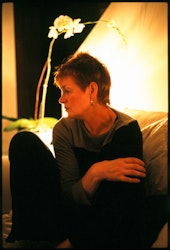 Rubbing her arm after exercises to restrengthen muscles damaged during testing of lymph nodes.   I go through the motions of showering, cooking, shopping for food, visiting doctors, giving blood and taking chemo infusions. During the good days, when friends turn up, I am cheerful. “It’s not too bad. It could be worse”, I say. I talk myself into feeling better and will them to feel better about me. On the bad days, when I feel wretched and emotional, I don’t answer the telephone or the door. I am forgetful and fuzzy in the head – chemo-brained. I am going through menopausal hot flushes all over again. My whole body is tender and feels bruised. My clothes are uncomfortable on my skin. My mouth is sore and the skin on the roof of my mouth is peeling off. My fingernails and toenails hurt and my feet are raw. Tim sees me as I really am. I am the closest to honesty with him. He can see through any bravado. It’s not easy for him. Bless him. He has wonderful intuition and comes when I most need him to, whether he knows it or not. He listens, shops, transports, loves and supports and he does it all for me. He knows when I want to be by myself. I feel sorry at times he has no other siblings to share all this with. It is not fair on him. But he is blessed to have Lizzie in his life. She is there for him and has been all along. I love her for that. She is his support just as he is mine. And we both have Pete. We share my load as a family. – Ib