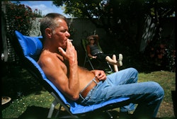 The first family Christmas in thirteen years. Dad takes control of the barbeque. Sausages, bacon, eggs, hash-browns, mushrooms… I fall asleep on the couch after eating and wake up to see Mum and Dad sitting outside in the sun. They talk about old times, family stuff, air old problems that have lingered long unresolved. I get up and join them. Conversation changes to happy anecdotes about my childhood and our extended family. Dad follows the sun, his skin glowing a deep fleshy orange while Mum hides in the shade. The three of us fall silent. A quarter of an hour passes before Mum fishes for a remote and chooses some background music. We listen as the sun begins a slow dive in the distance. The temperature drops and Mum disappears inside. She returns wearing a beanie hat and passes Dad his t-shirt and jersey. We enjoy a nightcap as the light turns from gold to a deep, cool blue. Dad finishes his drink and I offer to drive him home. He hugs Mum goodbye awkwardly, standing rigid while patting her on the back. After pulling away, Dad and I move towards the front gate. Mum follows. “Thank you for the wonderful day,” Dad says before getting in the car. “Just like old times,” Mum replies. I smile. In the background I hear the faint sound of Mum’s stereo. It’s on random play and has landed on another Van Morrison track. As my parents part company and Dad drops into the car I catch the final line of Coney Island. “Wouldn’t it be great if it was like this all the time?”