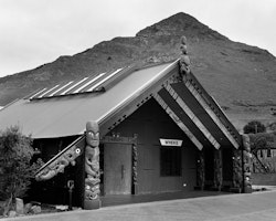 Whilst Te Rangi continued his raids on the South Island his son Te Wheke remained at Rāpaki. The Marae, ‘Wheke’ is proudly named after the chiefs son, whose name means octopus. Together, Rāpaki Whānau (family) built the original marae ‘Te Wheke’ which opened on 30th December 1901. In November 2008 Te Wheke was dismanteled and cremated after serving the community for over one hundred years. In its place was built a traditional whare whakairo (carved house).