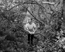 Sophia is the Granddaughter of June Swindells. June’s ancestoral line stems from Rāpaki  and she is now an active member of the community. Sophia lives in Rāpaki  with her parents and older brother on a section of land infront of her grandparents. As the population of Rāpaki ages, notably fewer children live in the area. To entertain herself, Sophia builds huts in the bush that surrounds her house. She’s convinved that Tamatea controls the weather.