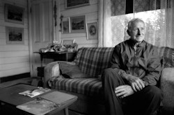 I was born in Linwood but came out here to Halswell when I was very young. No more than a year old. My father got the place after the First World War. He milked cows here – had a milk run as well. The place was only twenty acres in the old measurements, but it managed to keep them going. Me too: I’ve lived here off and on all my life. Got a place in town as well, but I hate the city. I still run about eighty sheep so I’m out here a lot of the time. I was here yesterday inoculating them and managed to stick a needle in my leg. It’s a bit sore today, but at least I should be right with the salmonella. Anyway, I love the stock work. Can’t sit and do nothing, and it keeps me out of mischief. Eighty years, it’s a long time to be in the one place, but that’s how it was then. People today, they don’t stick, don’t stay. One time you would’ve lived all your life in the same house, now you get people that don’t know who their next-door neighbours are. Personally, I don’t think you can really call a place home if you’re shifting about too much. You don’t have the memories of it. This might be a run-down old dump now, but to me it’s a castle with all the memories still here. I can look around and say that Mum and Dad used to sleep over there. Here there was a wall I took out to make the room bigger. All heart rimu in those studs too. The boards were full of borer, but they couldn’t get into those studs. You can walk into every room and get swallowed up in memories. All flooding back at you. I remember the garden here and the day my mother died. They kept prize gardens, my parents, a good acre or two of roses and irises. Beautiful it was. I don’t know how they kept it going really. Mum’d been working there that morning and she didn’t feel too good. I think she had something wrong with her but wouldn’t let on. The doctor sent her to the hospital and she died that night. I think she knew it, but there you are, she was busy until the day she died. It was a good way to go. I’ve had two or three heart attacks myself, and the doctors always saying to get plenty of exercise. ‘Plenty of exercise!’ I said ‘You come out with me. I’ve eighty sheep and no dog now. I’m getting enough exercise.’ It is getting frustrating. though, not being so able. Each year I’m doing less and less. A year ago I’d be up there topping the macrocarpas, but I don’t think I’ll be able to do it this year. It’s darned annoying that. I still want to do it. What do they say? The spirit is willing but the flesh is weak? I’d have a go if I could, but the balance is going and it’s getting tougher all the time. It’s hard to watch it all going downhill like this. Sometimes it’s even hard to look at the old photos, seeing what it was like, how good it all looked . . . But like I say, the flesh is weak. You do what you can, let the memories take care of the rest.