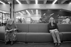 When I first began working here it felt like a dream come true. Libraries have a great significance in any society. They are the repositories of information, and free access to information is of such fundamental importance. I feel really passionate about that. It’s such a special place and it belongs to us all. It’s true! It’s incredibly inclusive – you don’t have to have money up front to come and use it. Every morning there are twenty or thirty people waiting outside for the doors to open, and I don’t think there’d be too many other places in Christchurch where that happens. People come for a multitude of reasons, and we do our best to provide them with what they need. Librarians tend to be the type of people who want to share what they know. I think that’s one of the things I like most about the job – just doing what you’d do for a friend. Because I love books and read so much myself, it’s great being able to help people find the book they want, or to recommend one for them to read. There are also a lot of people who come in looking for information about something. I love that too. It can be like detective work – knowing where to look and how to find it. There are so many things people want to know about, and it’s a wonderful feeling helping to track down exactly what they need. I think people in Christchurch have a pretty good idea of how important the library is to them – perhaps more so than in some other places. Certainly when the council tried to institute costs on each book, people rallied around in a big way. People aren’t silly, they know what they have to lose. I think that’s a great thing. We try very hard to make the library a good place for people to come to. I’m really proud to work there. There are times in life when you can feel something was a mistake or wondered what else you might do, but I’ve never felt that about the library. If I get to stay here until the end of my working days I’ll be very happy.