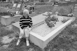 Superficially, my favourite place could be the Bay of Islands or Arrowtown – two places that I particularly enjoy in New Zealand. But at this stage in my life the place I prefer to go to when I need to contemplate or just to sit quietly is the Lyttelton cemetery. My former husband, Sam, is buried there, and next to him there is a gap and then there is Christine’s grave. I used to sit there between the two of them. Recently, however, someone else has been buried there. Now I sit either on Sam’s grave or Christine’s. Just to be there. The overwhelming tragedy of my life has been the loss of Christine. She was my eldest child – my first-born. She was on a picket line at Lyttelton and was knocked over – run down – and she died two days later. I brought my children up to have a strong sense of social justice and to be independent. I think I might have made too good a job of it. Christine was very independent. I am incredibly proud of her, but her death is the thing that will colour the rest of my life. I don’t believe I have enough years left to come to terms with it. I am a practising Catholic and that’s been of incredible assistance to me, but at 2 a.m. in the morning you can find yourself staring at a huge black hole and you know . . . you know you are probably not going to climb back out of it. Sitting there with her on the hill is a help. Sometimes I arrive feeling quite distressed, although not as distraught as I was three years ago when I used to feel I would lose my mind. What seems to help is the tranquillity of that place. I find Lyttelton a very calming place. I had many happy years living there, and I suppose the feeling is that I have come home. Yes, that’s it, I think. Sitting there, being there, it feels like I have come home.