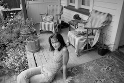 I grew up in a small town with limited options. I was young and had a child, a daughter I was bringing up on my own. It was not an easy time. People can knock your confidence and you can get really isolated on your own with a toddler. I moved to Christchurch six years ago because I felt there must be more to life than what I had. I wanted to be in a place where people were more open-minded. I suppose I wanted the sort of stimulation a larger place can give you. I love art and theatre and movies, all the cultural things. I didn’t want to be in a place where the only option on a Saturday night was the pub. It hasn’t all been wonderful. Moving here was a bit of a cultural shock in itself. In the country you just parked your car and left it unlocked, you didn’t lock your house or anything. Very soon after I moved here my car was stolen, so I learnt about that. It was a bit scary being on my own at first, but now I love it here. I suppose I’ve lived here long enough to feel part of the community. Also, I think in the last couple of years I’ve become more confident as a parent. My little girl goes to school now and there’s more of a routine. I have more time. I’ve been so involved and concerned with her – making sure that everything is all right for her. It’s like part of me has been sleeping for the last ten years and it’s just woken up. It took a lot of time, a lot of soul-searching, to know what else I wanted to do with my life but now I have it. I want to study at university – I am studying at university – and I’ve been on cloud nine ever since I started. I’m doing history and anthropology at the moment –where we’ve come from, where we are and where it’s at. Then I want to do some philosophy and, finally, major in political science. The meaning of life and all that stuff. Who knows why we’re here, but while I am, I want to do some good. I – we – belong here in Aotearoa. It’s our place. I grew up here and my daughter gets to grow up here. I think that means we’re lucky. It’s what makes me feel I want to give something back. Which finally brings me to my place – my verandah. That’s where I make all my plans. After a long day I can’t wait to get back to it. Make myself a coffee, sit in my favourite chair and meditate on things as the world goes by. It’s where I read my books, make my lists, dream about the things I’ll do. As I said, the meaning of life. I feel I’m at a real crossroads right now, a new starting point and I intend to make the most of it. I have a real feeling for where we live, for our country. I want to do something that has an effect on people’s lives for the good. This is where I sit and think about what that will be.