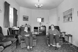 We were born one day apart, right there, in the front bedroom. One born at ten to midnight, the other at ten past, so we have different birth dates. The second and third of January 1916. Usually, with twins, you grow up and get married and that’s the parting, but we haven’t ever thought of getting married, we’ve been together all our lives. Undiscovered treasures. Back in 1948 some netball friends nicknamed us the Heavenly Twins. The name seemed to stick and they’ve called us that ever since. It’s how we are I suppose, never apart. We live together, worked together, played sport together – netball has been the big thing in our lives – and except for technical college we were always in the same classes at school together. In a way it was a different world back then – families were tighter, or at least we were lucky enough to have a very close family. Our brother was into football and swimming, our two sisters were operatic singers and, as I said, we’ve been into netball all our lives, so we were a mixed lot. Cultural things and sporting things, but always very close. We’ve had a lovely life really. We don’t know what it’s like to be without family, not the way some people are. That must be very hard.Sometimes you feel a change; that our generation seems to have moved on. I can remember someone saying once, ‘Oh, you’re still here,’ as though we shouldn’t be. But we’ve never been without family. We had thirty-seven of us this last Christmas – real family. Ours has always been a home – lived in – not some sort of show house. Our parents encouraged us to bring our friends home and there must have been hundreds – sportspeople and so on – who stayed with us over the years. You wouldn’t think this place was eighty-eight years old, would you? Time’s gone on so quickly, but I guess home is where you make it and we’ve been here all our lives. Mum and Dad both died here, in the same front room we were born in. I think we’d both like to do the same. We’ve always said we’d leave in a box. Not that we’re in any rush. The place has been here now for eighty-eight years and we’d love to see it get to the century. Be quite nice to do the same ourselves.