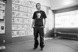 When Heidi and I got engaged, that’s we got our first tattoos done. They were down our sides – different designs on each side – and they kind of match. We didn’t get the usual heart and name – we would never have names put on each other – but just to know you have that special mark, it makes you appreciate things. That was early in the tattooing. I suppose I’d started off like most people do, you get a bit of piercing done – just like dipping your toes in the water. It wasn’t too bad. A little bit of pain and at the end of the day a little reward. After I had three or four few small tattoos done, Kelly, being Kelly, was quite easy to talk to and we were just sitting in there talking to him and I was telling him how I didn’t like the work I was doing much, the boss and all that stuff. Then Heidi said, ‘Why don’t you come here and work for Kelly. Become a tattooist.’ Kelly picked up on it and I kind of liked the idea when I thought about it. He said, ‘Okay, draw me some pictures and I’ll talk to the boss. We’ll see how it goes.’ The next Saturday I was down there working. That’s pretty much how my apprenticeship started. A new start – that was just after Heidi and I got married. We’ve been happy ever after. I like this place because it‘s been here ten or twelve years and no-one really knows it’s here, not unless they get sent here or unless they happen to be walking past and notice it. It’s on Manchester Street. Quite a dark little shop, it kind of fits the tattooing persona pretty good really. It’s not well advertised or anything so people come along wondering: what’s this? You see people walk past and look in through the bars – they could just open the door and come on in, look at the pictures if they want, but they just stand there. I think, come on, I’m not a big scary bikie or anything. You’ve got to look if you want to find out, don’t you? I am getting to the stage now where people recognise my work and they come looking for me. I’m pretty happy doing what I do, but I guess the ideal would be to have my own shop where people would seek me out for my style. That’s the sort of thing you work towards.