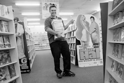 My job is videos – it’s not hard, there’s no pressure. Occasionally people will come in and complain about a video not working and you say, ‘I’m sorry about that,’ and give them a free video. That’s about the biggest problem you have. I mean, it’s not like you’re flying the Westpac Trust helicopter, trying to save someone with a broken neck. I hire out videos, and hey, I love doing it. I was a customer at Blockbuster for probably five years before I started working there. I was down there so often – it’s how I got to know them all there. I’m a bit of an insomniac, you see, and they don’t close till midnight. All my mates would have work or be at uni, so they’d be in bed by ten o’clock. Mum and Dad would go off to bed and Blockbuster was the one place I could guarantee someone would be up. There’d always be somebody I knew there, someone to have a chat with. The crazy thing is, since they’ve given me the job I’ll do, say, thirty-five hours a week there, but then I’ll spend another ten to twenty hours a week just popping in. I’ll go in and talk to whoever is working there, maybe sort through some videos or serve a few customers because I’m bored. It’s mad. I should be trying to figure out a way of being paid for it. I’m back at university now as well, doing a BSc in linguistics. I went there straight after school but dropped out after six months. This time around it’s going a lot better. I know how it works now. Eventually I’d like to join the police force. I was a bit of a geek at school. If someone was doing something, I was the person saying, ‘Look, you shouldn’t be doing that. You’ll get into trouble.’ I’ve got a fairly strong sense of right and wrong. I reckon I’d make a good cop. Right now, though, I’m enjoying where I am. I really love working with the people there. It’s so cool. There is no-one there I don’t get on with. The camaraderie and so on. Aside from home it really is the most important place to me right now.