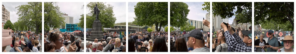 The Prince of Wales and Duchess of Cornwall greet onlookers after inspecting behind cordons of the damaged Christ Church Cathedral. With John Robert Godley.
